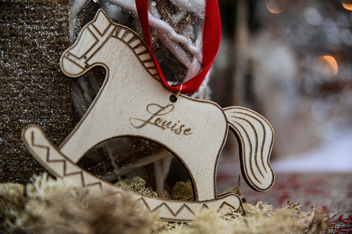 Boule de Noël cheval à bascule