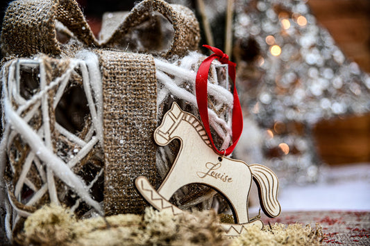 Boule de Noël cheval à bascule